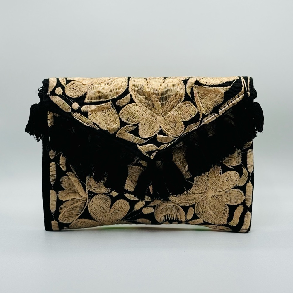 New envelope flap clutch. Brings strap to use as a crossbody. Handmade bag!